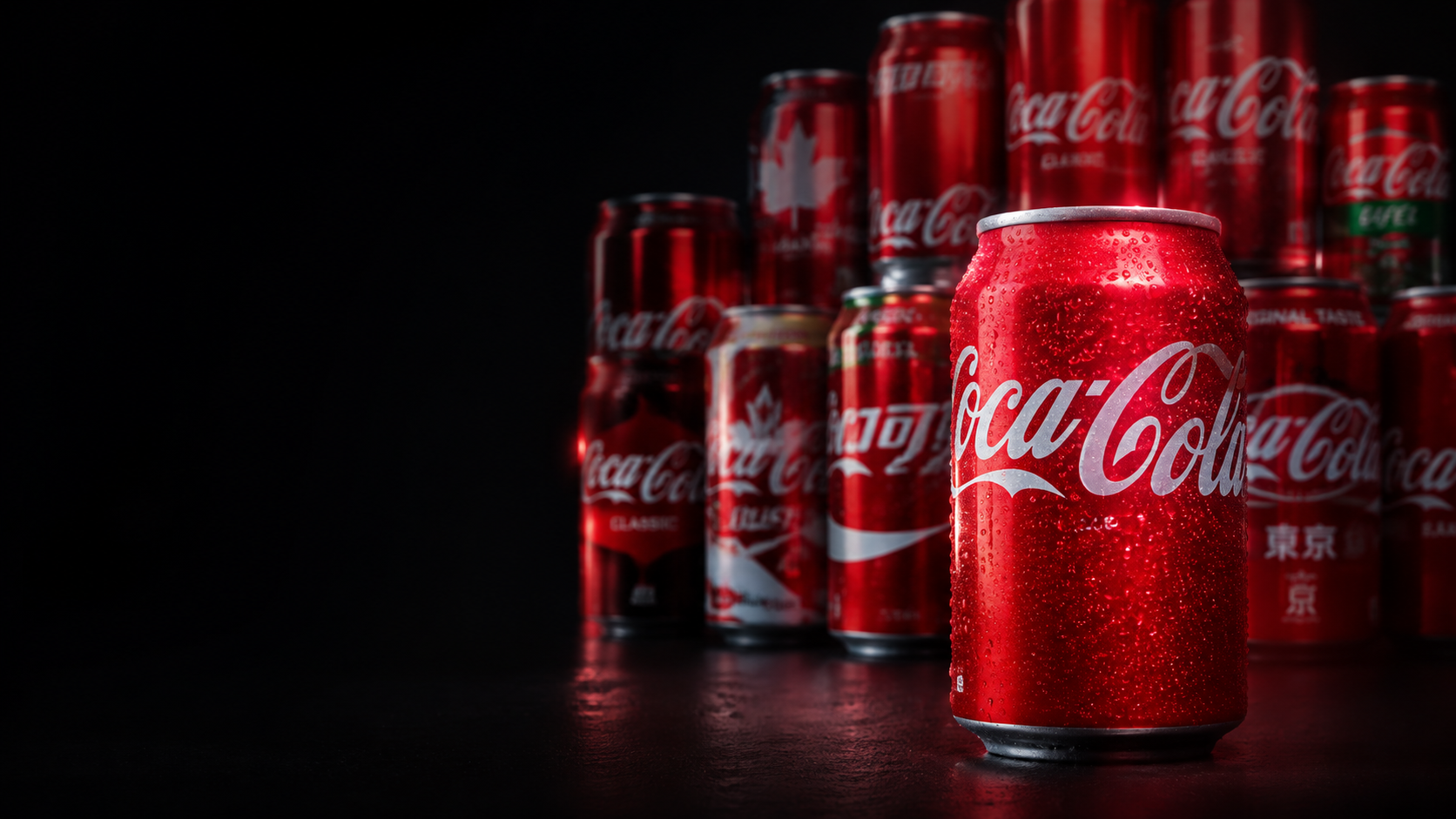 Red can in the foreground in front of a can collection