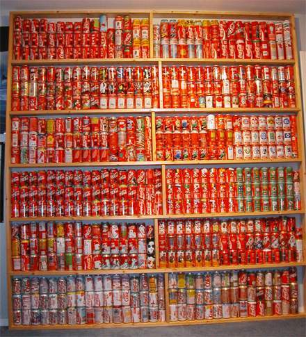 Shelves filled with Coca-Cola cans from the collection in the early 2000s